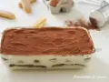 Tiramisù pronto, con 500 g di mascarpone, savoiardi e cacao. Ingredienti per una ricetta perfetta.